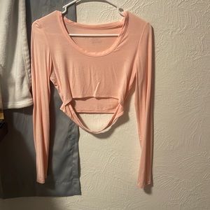 I am selling this pink crop top. It is a size medium